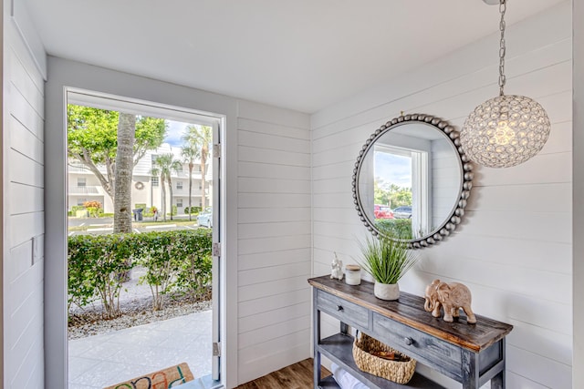 doorway featuring wood finished floors