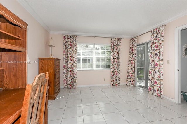 empty room with light tile patterned floors and ornamental molding