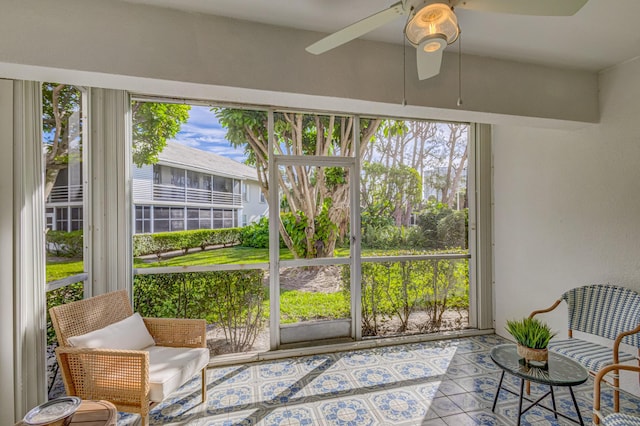 sunroom featuring healthy amount of natural light