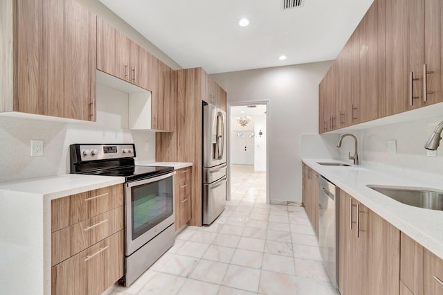 kitchen featuring sink and stainless steel appliances