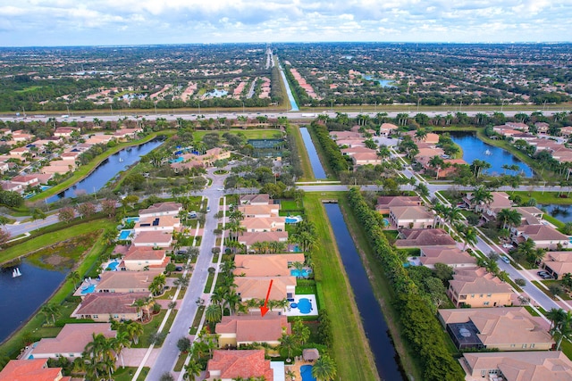 drone / aerial view featuring a water view