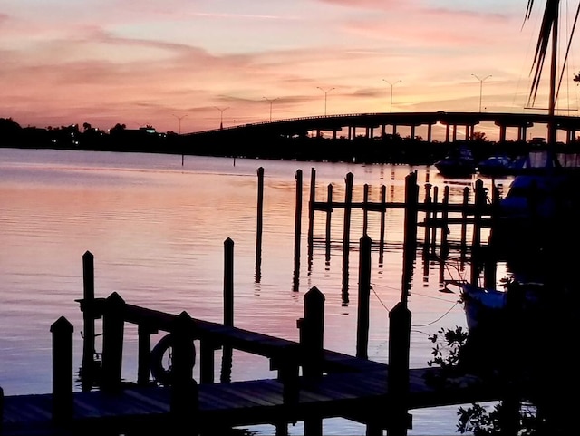 view of dock with a water view