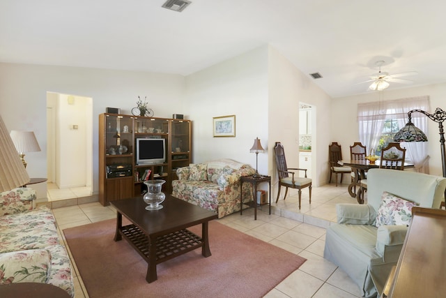 living room featuring ceiling fan and light tile patterned flooring