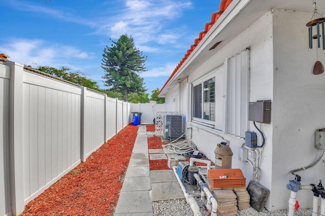 view of patio with central AC