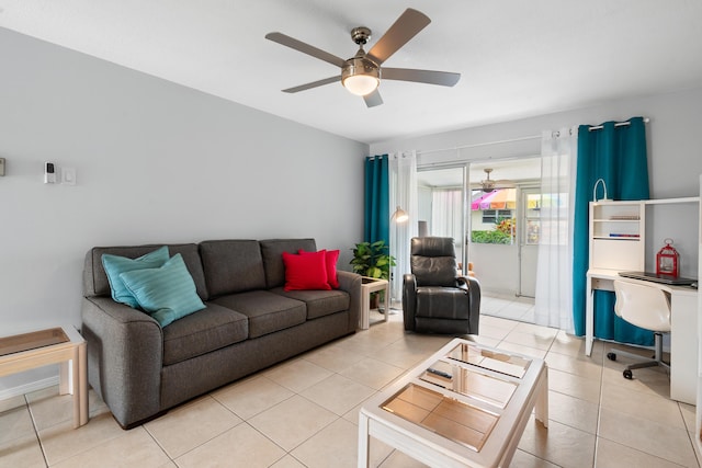 living room with ceiling fan and light tile patterned floors