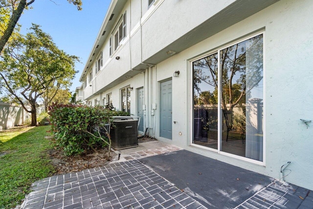 exterior space featuring a patio area and central AC unit