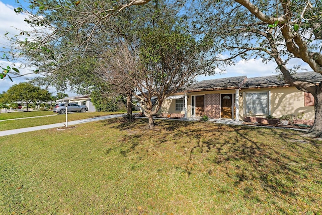 view of front of home with a front lawn