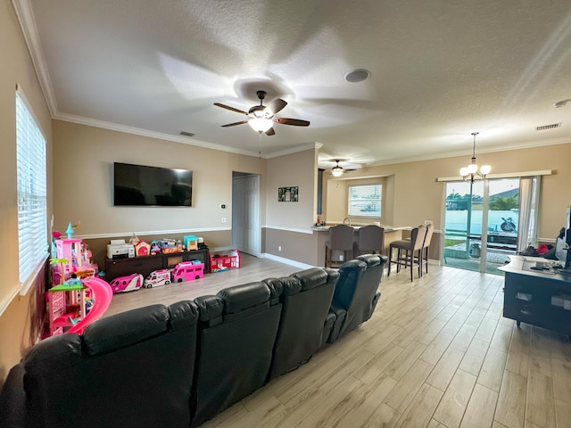 kitchen featuring kitchen peninsula, appliances with stainless steel finishes, decorative backsplash, light stone countertops, and sink