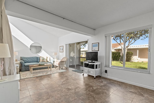 living room featuring a skylight