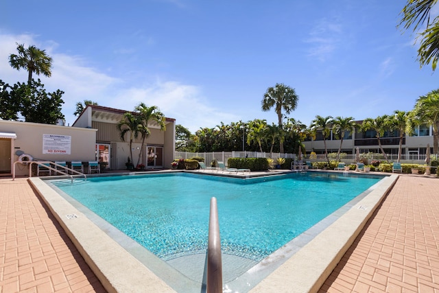 view of pool featuring a patio area