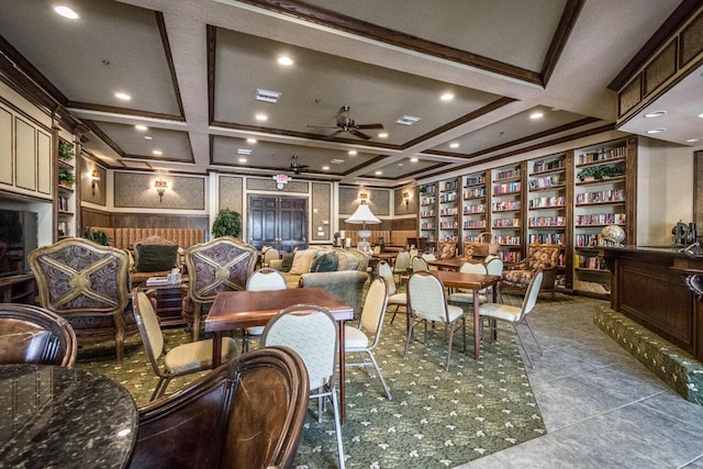 dining area with ceiling fan, coffered ceiling, and beam ceiling