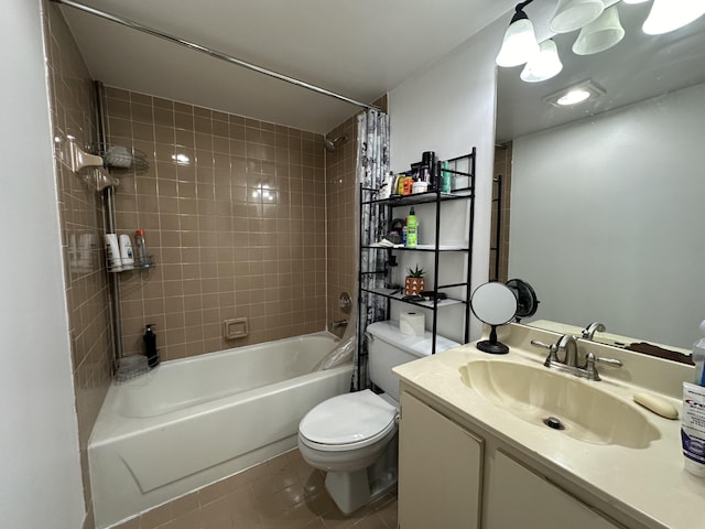 full bathroom with tile patterned flooring, vanity, toilet, and shower / tub combo