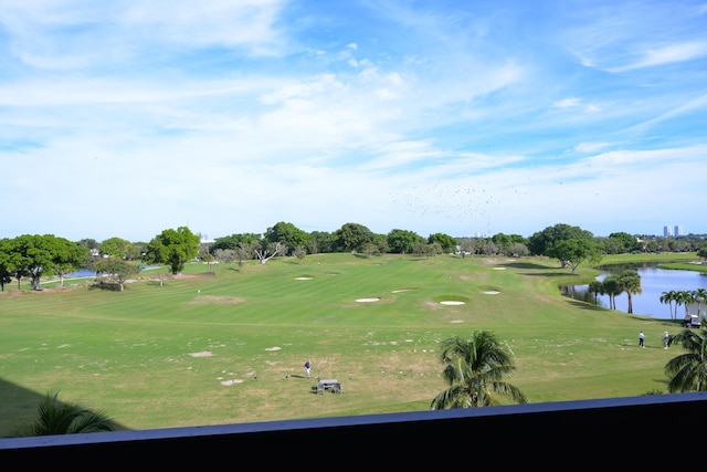 view of community with a water view