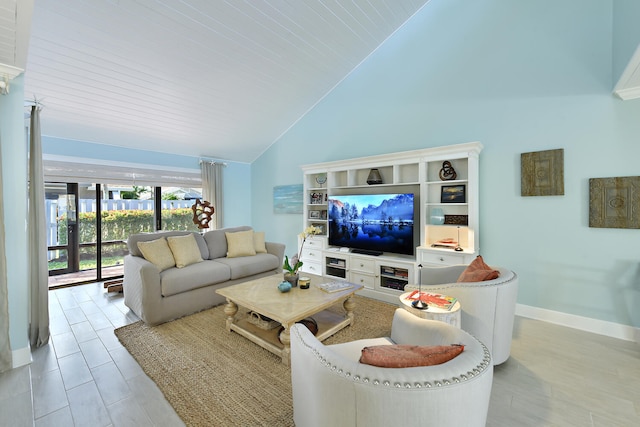 living room featuring a towering ceiling