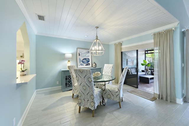 dining space with wood ceiling, crown molding, and a chandelier