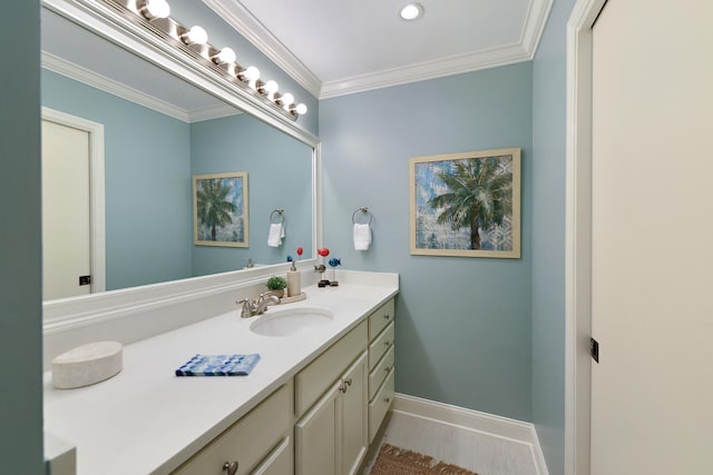 bathroom featuring vanity and ornamental molding