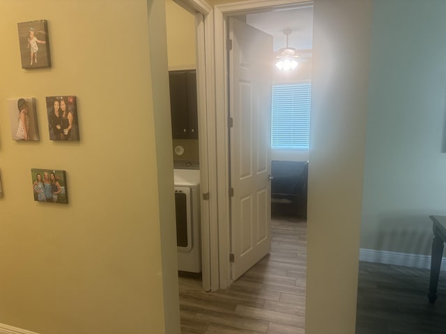 hallway featuring hardwood / wood-style flooring