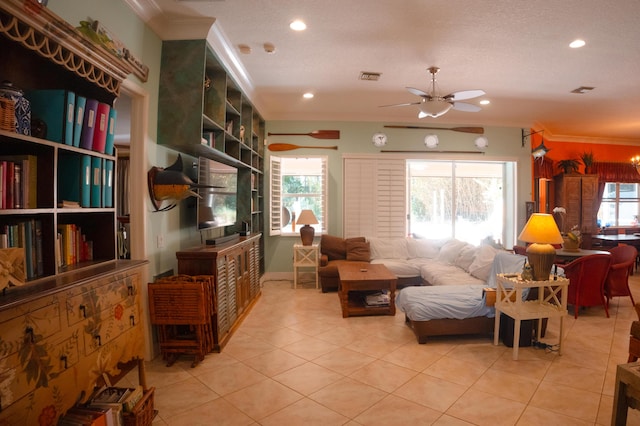 12858 153rd Ct N, Jupiter, FL 33478 - living room with light tile patterned floors, crown molding, recessed lighting, and ceiling fan