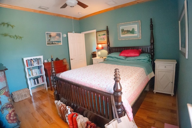 12858 153rd Ct N, Jupiter, FL 33478 - bedroom with visible vents, light wood-type flooring, ceiling fan, and crown molding