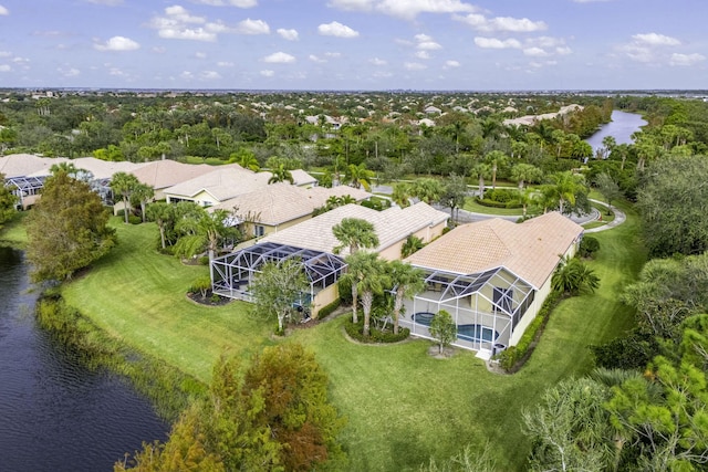 drone / aerial view with a water view