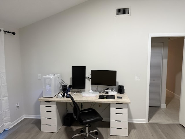 office space featuring light wood-type flooring