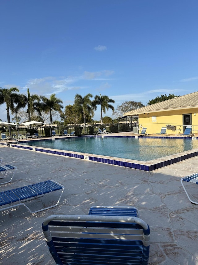 view of swimming pool featuring a patio