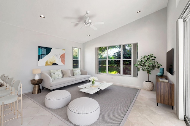 living room featuring light tile patterned floors, recessed lighting, a ceiling fan, high vaulted ceiling, and baseboards