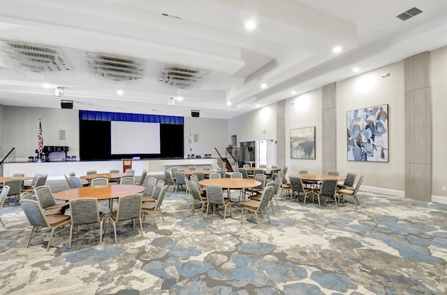 dining area with baseboards, visible vents, a raised ceiling, and recessed lighting