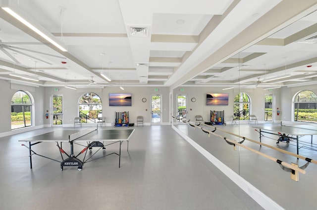 rec room featuring ceiling fan, coffered ceiling, visible vents, and baseboards