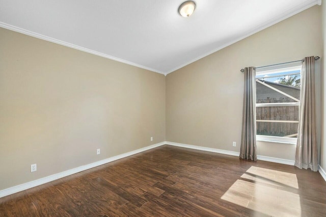 empty room featuring crown molding and dark hardwood / wood-style floors