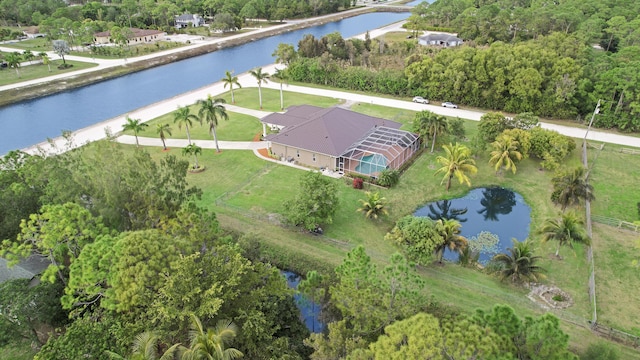 drone / aerial view featuring a water view