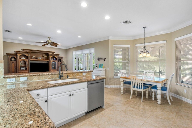 kitchen with light stone countertops, white cabinetry, dishwasher, hanging light fixtures, and sink