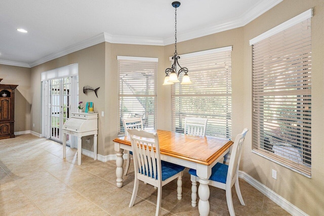 dining area featuring tile patterned floors, a chandelier, and ornamental molding