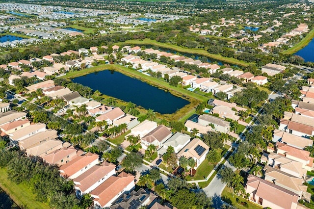 drone / aerial view featuring a water view