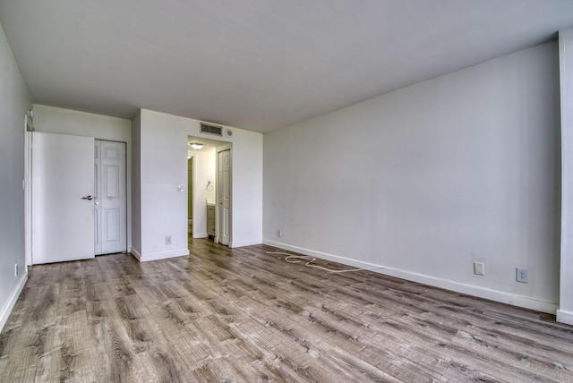 interior space featuring light wood-type flooring and a closet