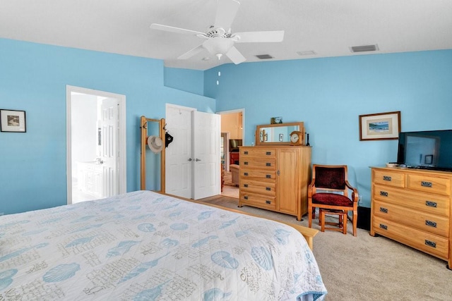 carpeted bedroom featuring ceiling fan and lofted ceiling