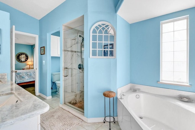 full bathroom featuring shower with separate bathtub, vanity, toilet, and a wealth of natural light