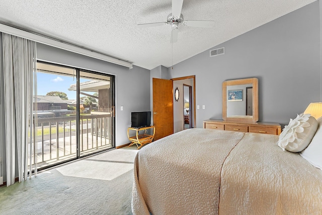 bedroom with carpet, visible vents, vaulted ceiling, a textured ceiling, and access to outside