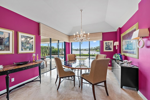 dining space with lofted ceiling, plenty of natural light, baseboards, and an inviting chandelier