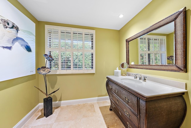 bathroom featuring vanity and plenty of natural light