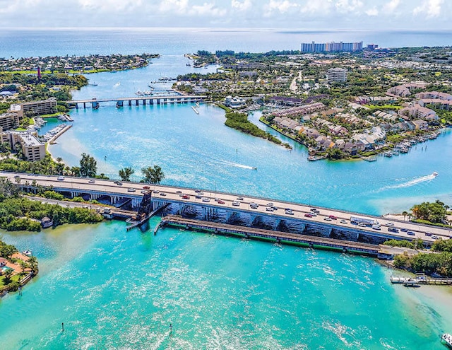 drone / aerial view with a water view and a city view