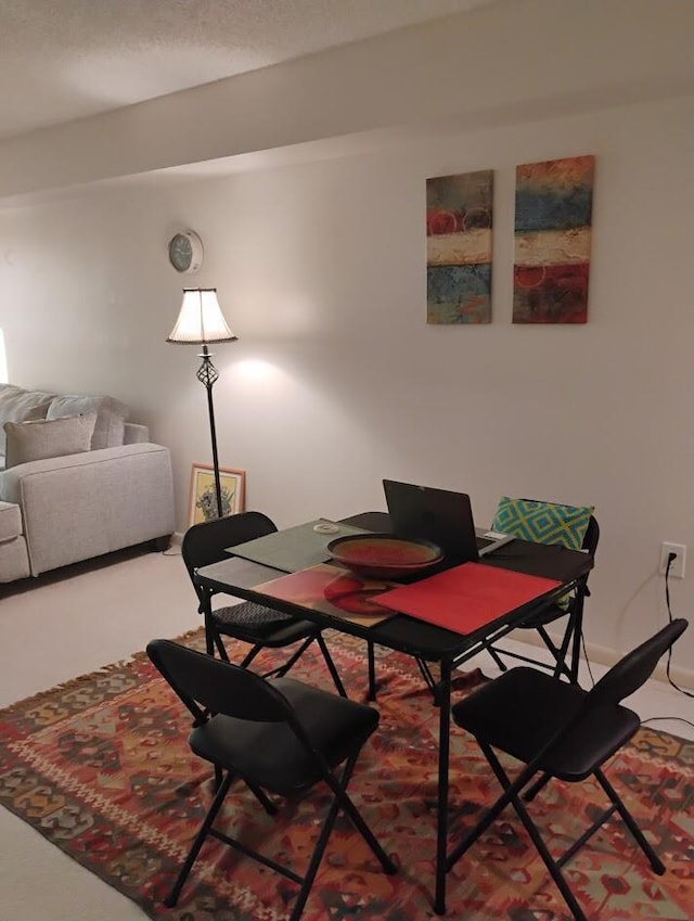 dining area with carpet floors