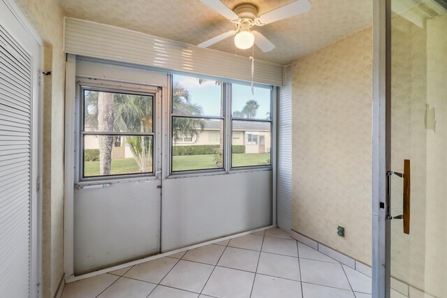 kitchen with decorative backsplash, ornamental molding, white appliances, sink, and light tile patterned floors