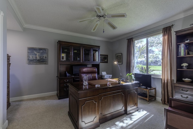 home office featuring light carpet, a textured ceiling, and ceiling fan