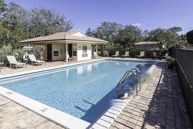 view of pool with a patio