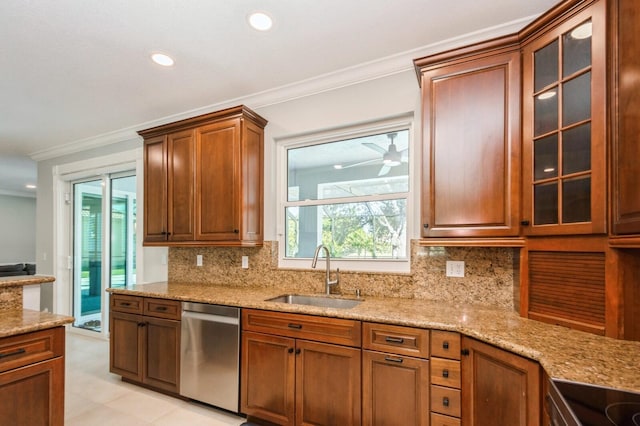 kitchen with dishwasher, tasteful backsplash, ceiling fan, and sink