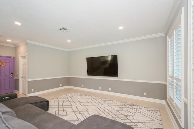 unfurnished living room featuring crown molding