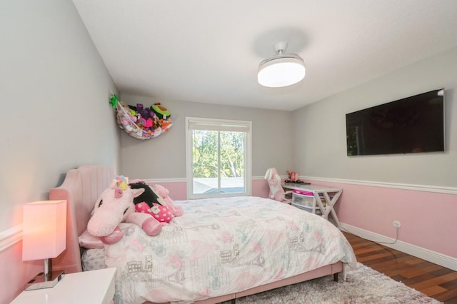 bedroom featuring hardwood / wood-style floors