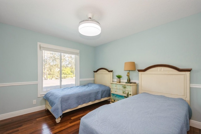 bedroom featuring dark hardwood / wood-style floors