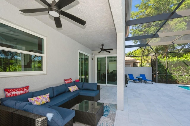 view of patio with glass enclosure and an outdoor hangout area